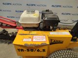 a small machine that is sitting on the ground