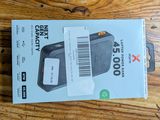 a box with a barcode on it on a wooden table