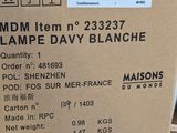 a cardboard box with a label on it sitting on a pallet