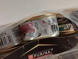 two cans of beer and a can of beer in a bag
