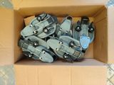 many pairs of shoes in a box on the floor