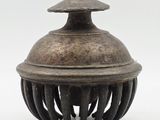 incense burner in the shape of a flower with a lid