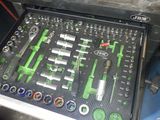 a tool tray that has a bunch of tools in it
