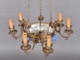 an image of a chandelier with five candles hanging from it