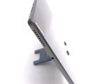 a close up of a cell phone on a stand