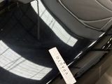a picture of a car seat with a sticker on it
