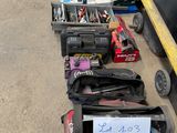 several suitcases are lined up in a row with a sign on them