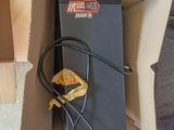 a box with a power supply in it sitting on the floor