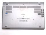a silver laptop with a blue sticker on it