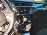 a picture of a car dashboard with a steering control