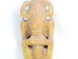 a close up of a statue of an elephant on a white background
