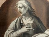painting of a woman reading a book in an oval frame