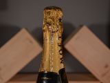 a bottle of champagne that is sitting on a table