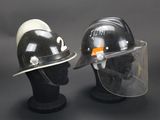 pair of black and white fire helmets with clear face shields