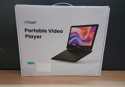 packaging for a portable video player in a box on a table