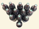 many bottles of wine that are wrapped in plastic