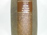 a brown book with a brown label on it