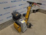 an image of a machine that is sitting on the ground