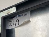 a sign on the door of a building that says saint cyr