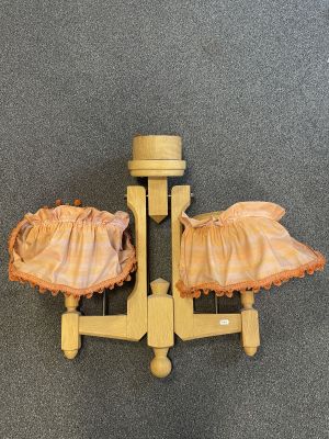a pair of shoes that are sitting on a pair of legs
