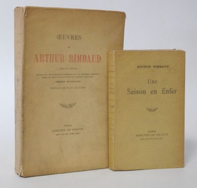 two books sitting next to each other on a white surface