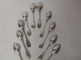 a lot of spoons and spoon spoons arranged in the shape of a tree