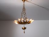a chandelier hanging from the ceiling in a room