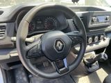 the interior of a car with a steering wheel and dashboard controls