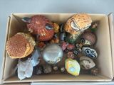 a cardboard box filled with assorted items on a table