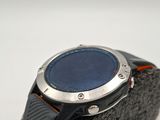 a close up of a watch on a piece of cloth