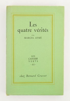 an old book with a green cover and a yellow border