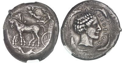 an ancient coin with a horse and rider on it