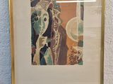 an image of a framed picture of a woman with a hat