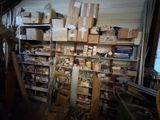 a room with a lot of boxes and boxes on the shelves