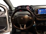 the interior of a car with a steering wheel and dashboard controls