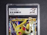 a close up of a pokemon card with a star in the background