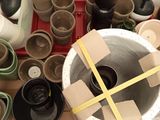 a lot of pots that are sitting on a table