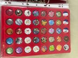 a picture of a red binder with a bunch of magnets on it