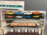 three toy trains in a display case on a table