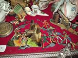 a red table with a bunch of different items on it