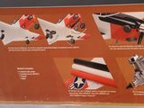 a box with instructions on how to make a paper airplane