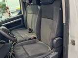 a white van with two seats in the back of it