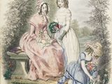an old book with a picture of a woman and two children