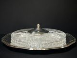 an image of a glass platter with a lid