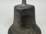 a small bell that is sitting on a table
