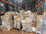 a large amount of boxes stacked on a pallet in a warehouse