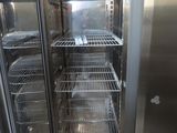 a refrigerator that has a lot of food inside of it