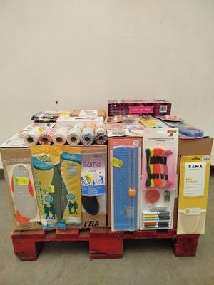 a wooden pallet with a bunch of supplies on top of it