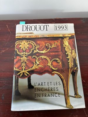 the front cover of a magazine on a wooden table