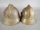 two helmets that are sitting next to each other